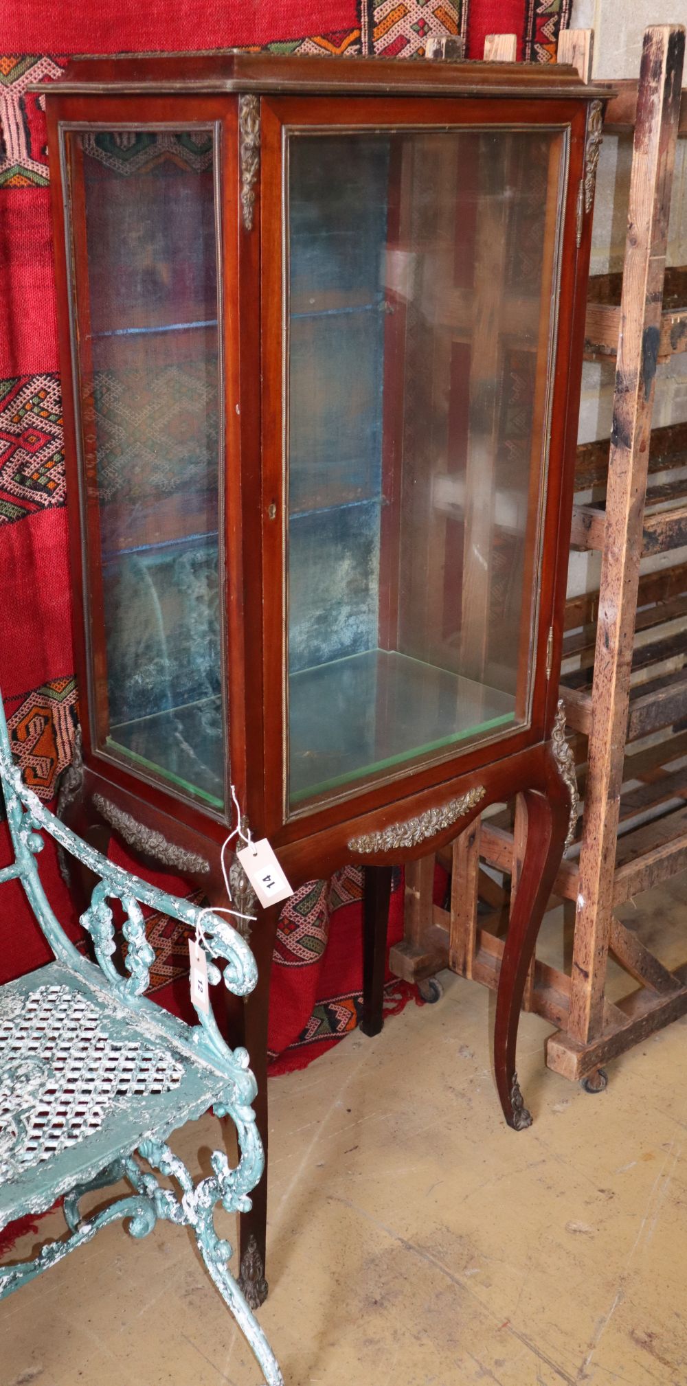 A Louis XV style gilt metal mounted mahogany vitrine, W.56cm, D.36cm, H.140cm